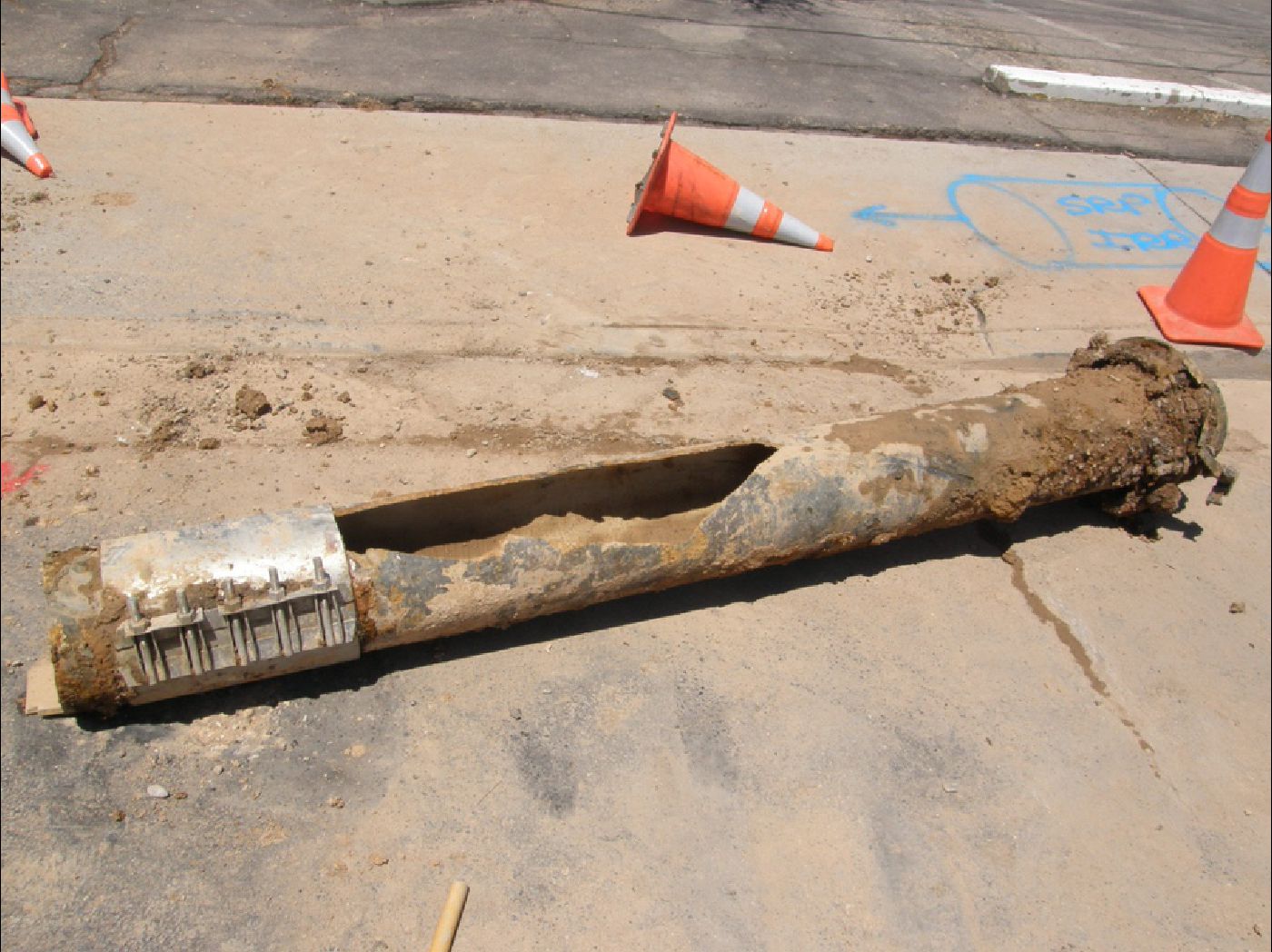 A water main that ruptured after a repair clamp had been used for the initial repair