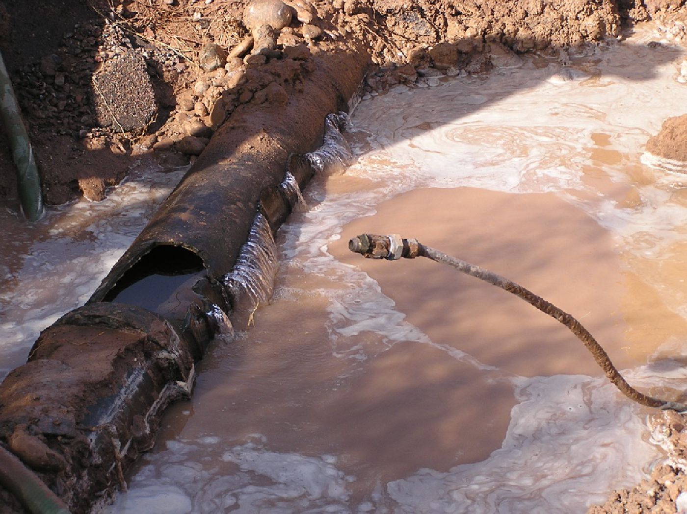 A water main break that blew out at the service connection